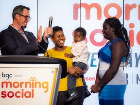 Adam Joiner, CEO of BGC Ottawa, cheered on 13-year-old Toni Johnson who spoke about her experience being a club member as well as being her school president. Johnson came to the stage with her mother Viola and her little brother, two-year-old Prince Robert, at the BGC Ottawa Morning Social.