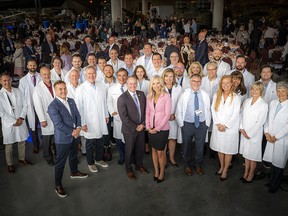The Ottawa Hospital returned to an in-person event for their annual President’s Breakfast, Tuesday, Sept. 13, at the Canadian War Museum. All of the table captains, donning white coats, gathered for a group photo with Cameron Love, president and CEO of The Ottawa Hospital, and event co-chairs Sarah Grand and Jeff Clarke.