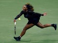 TOPSHOT - USA's Serena Williams hits a return to Estonia's Anett Kontaveit during their 2022 US Open Tennis tournament women's singles second round match at the USTA Billie Jean King National Tennis Center in New York, on August 31, 2022.