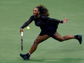 TOPSHOT - USA's Serena Williams hits a return to Estonia's Anett Kontaveit during their 2022 US Open Tennis tournament women's singles second round match at the USTA Billie Jean King National Tennis Center in New York, on August 31, 2022.