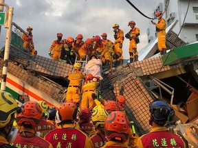 - A strong earthquake struck southeastern Taiwan on September 18, bringing at least three buildings down in a small town and tearing up roads -- but forecasters said the threat of a regional tsunami had passed. (Photo by Handout / Taitung County Fire Bureau / AFP)