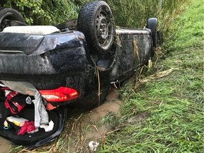 Ottawa firefighters used 'cribbing' technique to rescue a person whose vehicle had flipped into a ditch on Canaan Road on August 31, 2022.