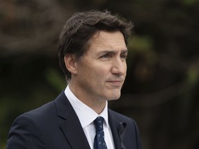 Prime Minister Justin Trudeau delivers a speech during the Liberal summer caucus retreat in St. Andrews, N.B., Monday, Sept. 12.