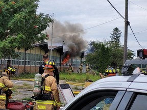 Ottawa firefighters were at a vacant school in Sarsfield Sunday morning to battle a two-alarm structure fire on Colonial Road.