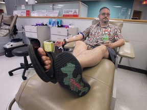 Walter Cassidy donates blood for the first time in more than 30 years on Monday, September 12, 2022 at the Canadian Blood Services office in Windsor. The self-identifying queer man is able to donate now that Canadian Blood Services has stopped screening based on gender and sexual orientation.