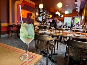 A Ugo cocktail of gin, Prosecco, elderflower liqueur, soda, mint and lemon inside Retro Gusto on Preston Street