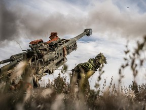 File photo: A gunner with 2nd Batallion Royal Canadian Horse Artillery fires an M-777.