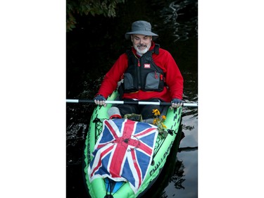 Simon Caters drapes his kayak in the Union Jack for the on-the-water tribute to the Queen at Mahogany Bay in Manotick this weekend.