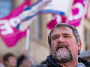 Mark Hancock, CUPE president, speaks during a rally in Saskatchewan, in 2019.
