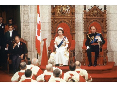 Prime Minister Pierre Trudeau, Queen Elizabeth II and Prince Philip in the Senate Chambers on Oct. 18, 1977, officially opening the session of Parliament in Ottawa.