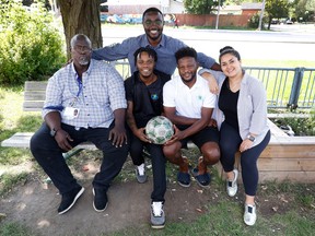 ANYO co-founder Reuben Nashali (back) poses with, front left to right, Jooris Ndongozi, Alois Mullins’s, Emmanuel Duala-Ekoko and Behnaz Alimardani. ANYO is being used to motivate the community to tackle broader issues, including gun violence.