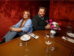 Siblings Nina Agostini and Cesare pose for a photo at their third pizza-based restaurant, Retro Gusto, in Ottawa Wednesday.