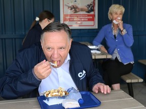 François Legault of the Coalition Avenir Québec was one of two party leaders who made poutine pit stops at casse-croûtes on the campaign trail on Sept. 1, 2022.