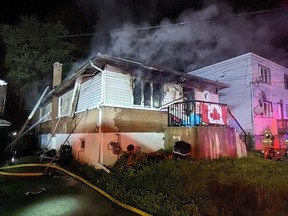Ottawa firefighters were on the scene of a fire on Ste-Anne Avenue off Montreal Road in Vanier Sunday morning. Crews reported heavy fire at the rear of a 1.5 storey detached building on arrival.