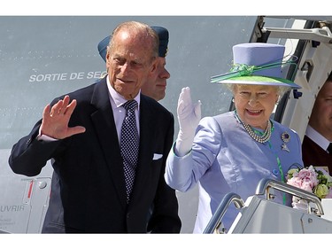 OTTAWA, ONT. -JULY 3, 2010- Prince Philip and Queen Elizabeth wave goodbye as they board the plane in Ottawa , July 3, 2010, bound for Winnipeg Manitoba to continue the next leg of the Royal Tour.