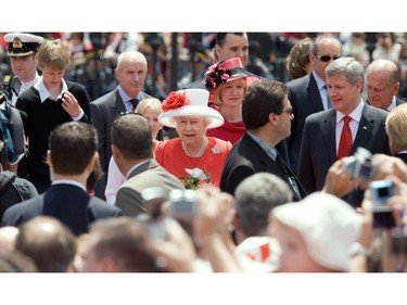 Queen Elizabeth and Prince Philip (far right) are joined by Prime Minister Stephen Harper and his family as they arrive on Parliament Hill for the noon hour festivities for Canada Day, July 1, 2010.