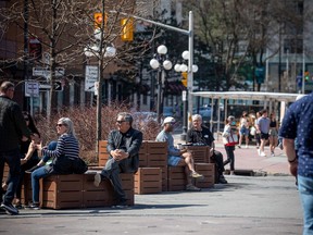 People enjoyed the warm sunshine in the ByWard Market Saturday, April 10, 2021.