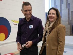 Mark Sutcliffe and his wife, Ginny, vote in the municipal election on Monday.