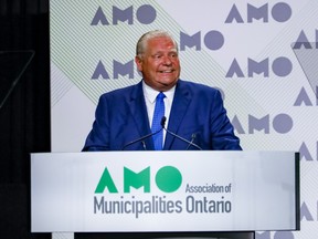 Ontario Premier Doug Ford, shown here speaking at the Association of Municipalities Ontario AGM in August, should take a second look at public sector wage spending.