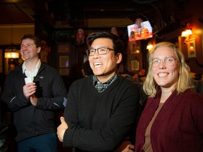 Wilson Lo, newly elected councillor for Ward 24, Barrhaven East, with his wife Amelia Howell, at the Heart & Crown Irish Pub in Barrhaven, Monday, October 24, 2022.