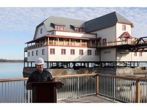 Geoff Green, Chair of the board of the Ottawa Riverkeeper talks to the media as he stands in front of the NCC's newly-renovated River House.
