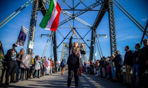 Saturday’s protest started at the National Gallery of Canada and marched to form a human chain stretching the length of the Alexandra bridge. This was the sixth local protest that all began in response to the death of Mahsa “Gina” Amini, a Kurdish-Iranian woman who had been detained by the “morality police” for failing to adhere to strict hijab requirements.