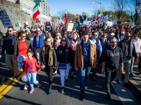 Demonstrators, including Prime Minister Justin Trudeau and his wife Sophie Grégoire Trudeau, marched in solidarity with Iranian protesters in Ottawa on Saturday. The protest started at the National Gallery of Canada with demonstrators later forming a human chain stretching the length of the Alexandra Bridge.