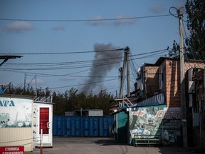BAKHMUT, UKRAINE, Oct. 12: Smoke rises from a Russian artillery strike in Bakhmut, Donetsk oblast, Ukraine. Leaders of G7 countries have stated that they will support Ukraine 'for as long as it takes' in its war against Russia following Monday's large-scale missile strikes across the country.