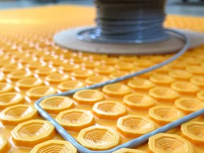 This plastic uncoupling membrane from Schluter is made to accept in-floor electric heating cables. This is a simple and reliable way to warm floors without using a lot of energy.