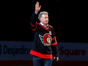 Ottawa Senators legend Daniel Alfredsson acknowledges the crowd as he takes the ice to drop the puck for a ceremonial face-off for the Sens home opener on October 18,2022.