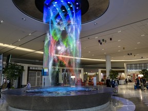 One of two colourful 25-foot-tall indoor fountains greets passengers at New York’s LaGuardia Airport, which one analyst said was once “one of the armpit airports of America.”