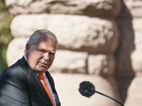 Ontario Premier Doug Ford speaks at a ceremony for the unveiling of the Platinum Jubilee Garden at Queen's Park, in Toronto, on Friday, Sept. 30, 2022.