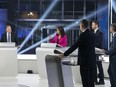 From left, CAQ Leader Francois Legault, Liberal Leader Dominique Anglade, Parti Quebecois Leader Paul St-Pierre Plamondon, Quebec Solidaire co-spokesperson Gabriel Nadeau-Dubois and Quebec Conservative Leader Eric Duhaime participate in a leaders debate in Montreal, Thursday, September 22, 2022. Quebecers will go to the polls on October 3rd.