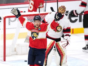 Florida Panthers defenceman Brandon Montour (62) celebrates a goal by teammate centre Carter Verhaeghe in the first period against the Ottawa Senators at FLA Live Arena.