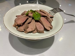 Dine at the restaurant: Peking Duck offers carefully roasted birds and fine Chinese dishes 8 Salted duck liver.