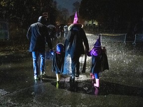 Trick or treating in the rain on Halloween in Ottawa, on Thursday, Oct. 31, 2019.