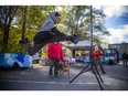 Damian Metcalfe, Majuqtuq Kigutaq in Inuktitut, demonstrates his skills in the one-foot high kick Saturday at the Inuit Olympics in Vanier.