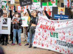 Iranian-Canadians for Justice and Human Rights led the march and rally in Ottawa on Saturday, starting on Wellington Street across from Parliament Hill before descending Elgin Street to the Hall of city of Ottawa.