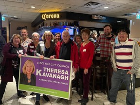 Ward 7 incumbent Theresa Kavanagh with supporters and campaign team Monday night at Lorenzo Bar & Grill.