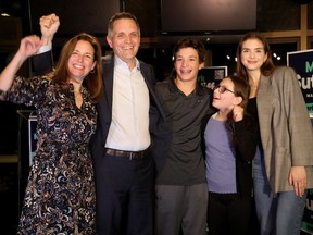 Mark Sutcliffe (along with his wife Ginny and three children, Erica, 23, Jack, 13, and Kate, 19) celebrates in a packed house of about 250 supporters at Lago restaurant on Monday night.