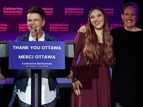 Catherine McKenney gives a speech to their family and supporters after conceding in the municipal election in Ottawa Monday. Catherine's daughter, Kenney, and wife Catharine Vandelinde were there in support.