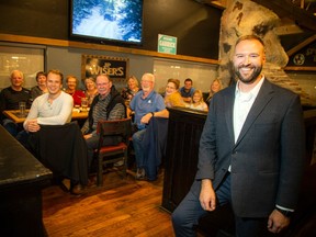 Richard Garrick, a city councillor candidate for Ward 24, Barrhaven East, with family and friends at The Barley Mow pub in Barrhaven.