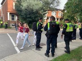 Ontario Provincial Police officers were also on the scene at the intersection of Somerset Street East and Russell Avenue in Sandy Hill late Saturday afternoon.