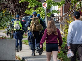 The law enforcement presence in Sandy Hill on Saturday included Ottawa Police Service, Ontario Provincial Police and City of Ottawa Bylaw Services officers.