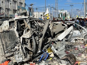 Wreckages of vehicles are destroyed at the scene of an explosion along K5 street in Mogadishu, Somalia October 30, 2022.