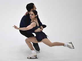 Deanna Stellato-Dudek and Maxime Deschamps of Canada perform in the pair's free skating program during the ISU Four Continents Figure Skating Championships in Tallinn, Estonia, Saturday, Jan. 22, 2022. Canada's Deanna Stellato-Dudek made history at the Grand Prix de France on Saturday, becoming the oldest athlete to win a Grand Prix figure skating event.