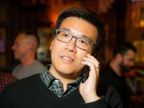 Wilson Lo, 30, seen on election night, is the youngest member of the council. He says his family members are very excited about the inauguration ceremony.