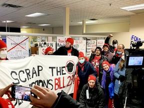 Protesters with ACORN organization  placed protest posters inside Municipal Affairs Minister Steve Clark's Brockville constituency office on Friday morning.