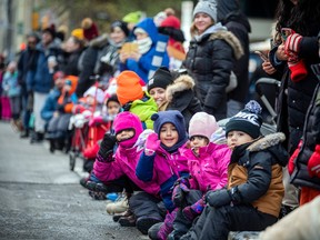 The Help Santa Toy Parade kicked off at City Hall and made its way along Laurier, turning left on Bank Street, and wrapping up at Lansdowne Park, Saturday, Nov. 19, 2022.