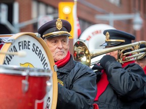 The Help Santa Toy Parade kicked off at City Hall and made its way along Laurier, turning left on Bank Street, and wrapping up at Lansdowne Park, Saturday, Nov. 19, 2022.